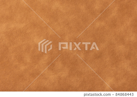 Texture of light brown old paper, crumpled background. Vintage beige grunge surface backdrop. 84868443