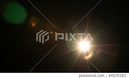Sun flare on the black background 84870383