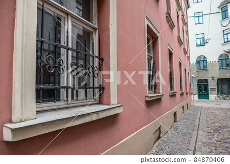 Old window of an historical building in street of Old Riga, Latvia 84870406
