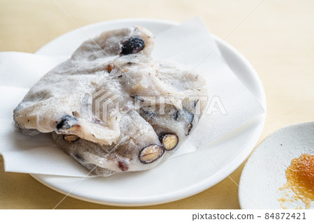 Baked black soybean rice cake Baked black soybean rice cake 84872421