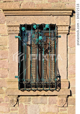 Ayvalik Cunda Adasi located in old antique house wooden windows, Turkey Balikesir 84872518