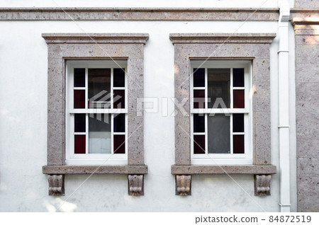 Ayvalik Cunda Adasi located in old antique house wooden windows, Turkey Balikesir 84872519