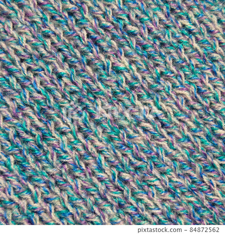 Handmade knitted fabric colored wool background texture Handmade knitted fabric colored wool background texture 84872562