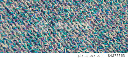 Handmade knitted fabric colored wool background texture 84872563