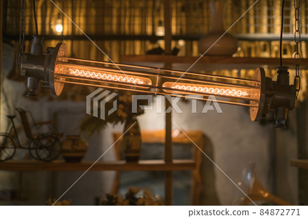 Steampunk architectural style design element of interior. lighting illuminated equipment. High quality photo Steampunk architectural style design element of interior. lighting illuminated equipment. High quality photo 84872771