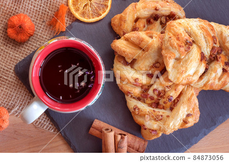 Maple and pecan plait Danish pastry Maple and pecan plait Danish pastry 84873056