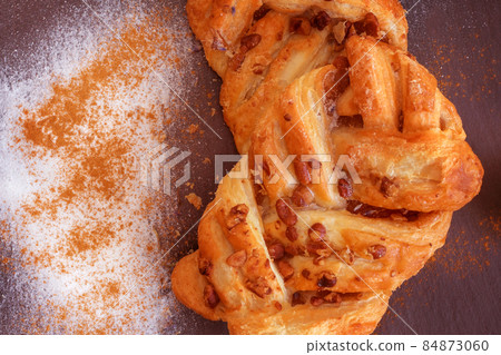 Maple and pecan plait Danish pastry Maple and pecan plait Danish pastry 84873060
