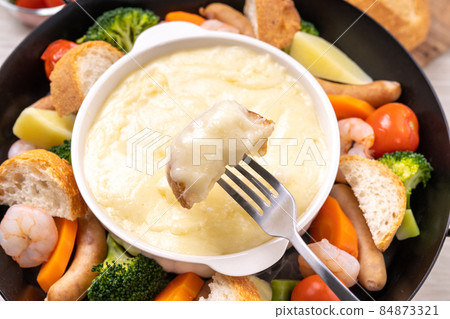 Cheese fondue made easily with a frying pan Cheese fondue made easily with a frying pan 84873321