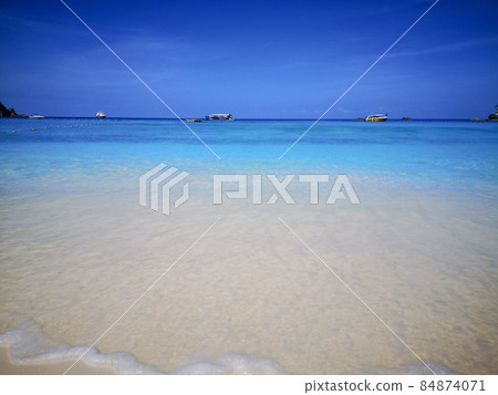 blue sky and very clear beach in Similan islands Thailand, donald duck or boots stone, background wallpaper. View of nice tropical Andaman Sea blue sky and very clear beach in Similan islands Thailand, donald duck or boots stone, background wallpaper. View of nice tropical Andaman Sea 84874071