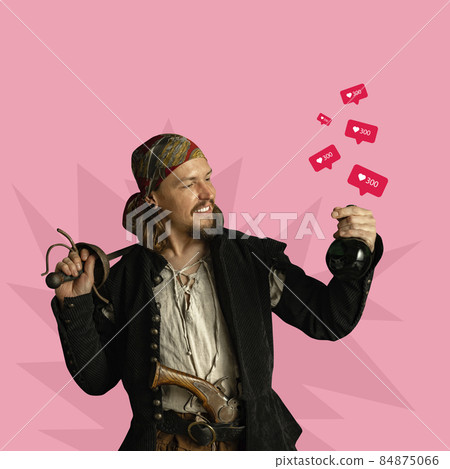Contemporary art collage of man in character of pirate having many red like icons isolated over pink background 84875066