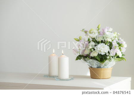 Flower arrangement and candle image 84876541