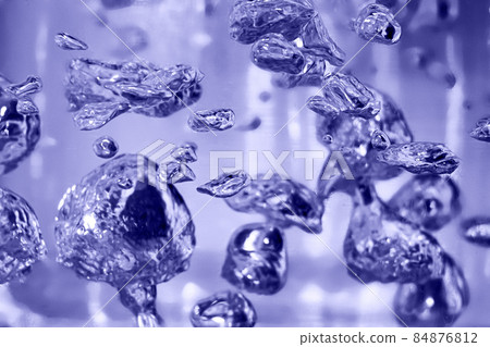 Drops and bubbles of mercury in water close-up. Trendy color of the year 2022. Dangerous chemical element, the scientific experience. Defocused image, motion blur Drops and bubbles of mercury in water close-up. Trendy color of the year 2022. Dangerous chemical element, the scientific experience. Defocused image, motion blur 84876812
