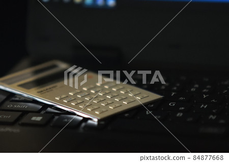 Calculator and laptop computer Calculator and laptop computer 84877668