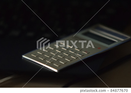 A calculator A calculator 84877670