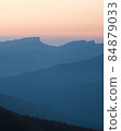 Mountain silhouettes layers in the sunset light 84879033