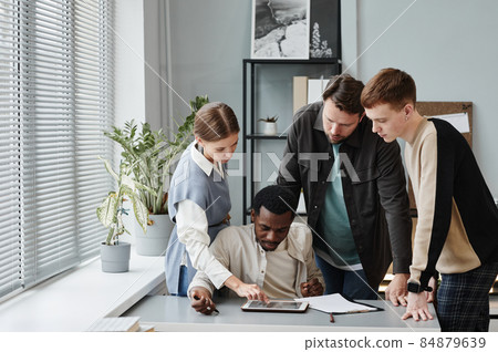 Group of designers working in team Group of designers working in team 84879639