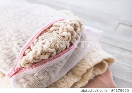 Washing knits and sweaters Image material for washing winter clothes 84879950