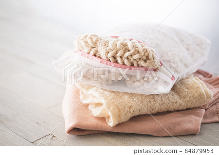 Washing knits and sweaters Image material for washing winter clothes 84879953