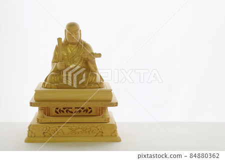 Buddha statue of Nichiren saint White background copy space 7 84880362