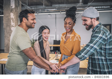 Young boys and girls showing togetherness gesture Young boys and girls showing togetherness gesture 84881696
