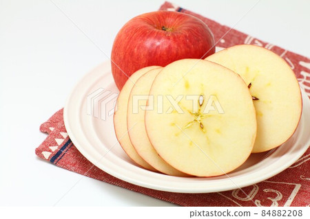 A plate of sliced apples, white background A plate of sliced apples, white background 84882208