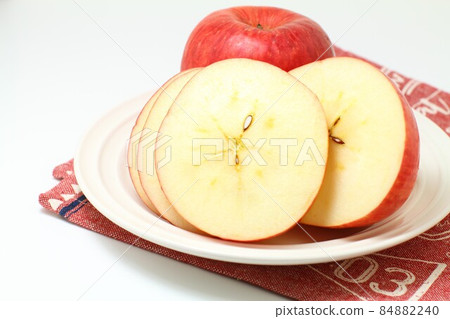 A plate of sliced apples, white background A plate of sliced apples, white background 84882240