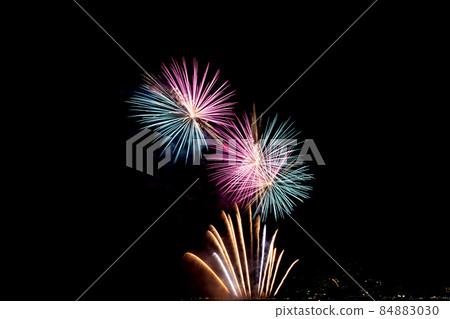Many flashing colorful fireworks in event amazing with black background celebrate New Year. Many flashing colorful fireworks in event amazing with black background celebrate New Year. 84883030