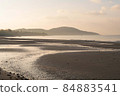 seashore beach wave coastline, mist, fog, sunlight water surface for holiday relaxation landscape 84883541
