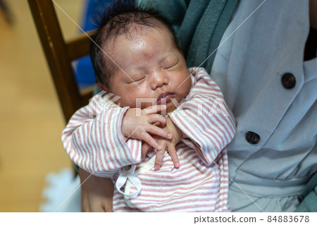 Breastfeeding mom and 1 month old baby Breastfeeding mom and 1 month old baby 84883678