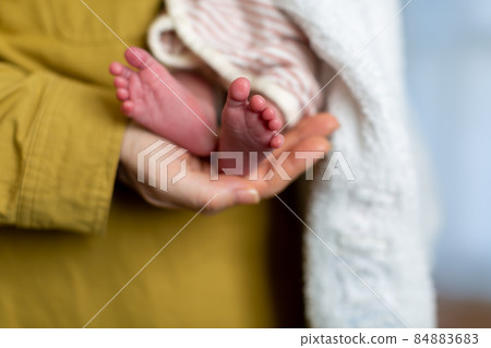 Breastfeeding mom and 1 month old baby Breastfeeding mom and 1 month old baby 84883683