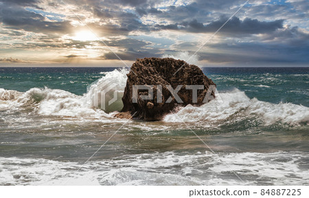 Fantastic seascape with waves crashing onto rocks. Corfu island, Greece. Fantastic seascape with waves crashing onto rocks. Corfu island, Greece. 84887225