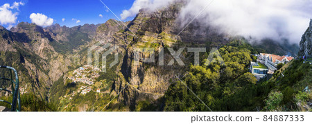 Madeira travel and landmarks. Curral das Freiras ('Nuns Valley') - magnificent village located in the heart of island surrounded by highest mountains 84887333