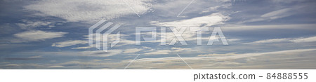 Image of a partly cloudy and partly clear sky during the day Image of a partly cloudy and partly clear sky during the day 84888555