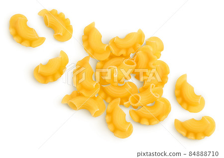 Pasta cornetti creste macaroni isolated on white background with clipping path and full depth of field. Top view. Flat lay 84888710