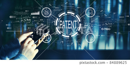 Patent concept with person using smartphone Patent concept with person using smartphone 84889625