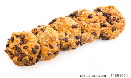 cookies with chocolate and hazelnuts on a white background cookies with chocolate and hazelnuts on a white background 84891664