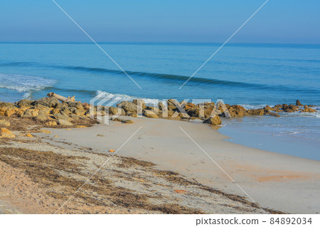 The rocky Atlantic Coast, at Marineland Beach in Marineland, Flagler County, Florida The rocky Atlantic Coast, at Marineland Beach in Marineland, Flagler County, Florida 84892034