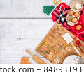 Xmas cookie for Christmas and Happy New Year. Gingerbread with decoration at home. 84893193