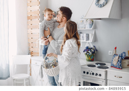 Family with little son in a kitchen Family with little son in a kitchen 84893915