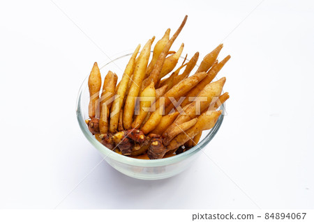 Finger root in glass bowl on white background. Finger root in glass bowl on white background. 84894067