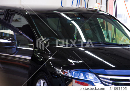 Black car indoors 84895505
