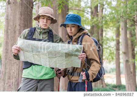 Two men looking at the outdoor map Two men looking at the outdoor map 84896887