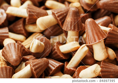 Mushroom cookies in chocolate glaze as a texture. 84897395