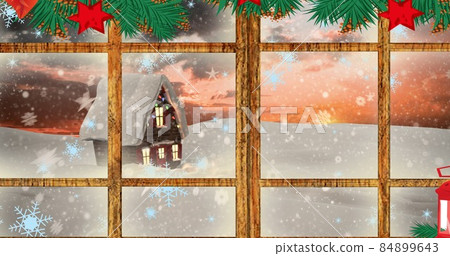 Composite image of snow covered house seen through decorated window in christmas, copy space Composite image of snow covered house seen through decorated window in christmas, copy space 84899643