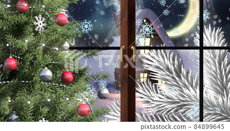 Composite image of decorated christmas tree at window in winter, copy space Composite image of decorated christmas tree at window in winter, copy space 84899645