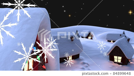 Composite image of snowflakes and snow covered illuminated houses at night 84899648