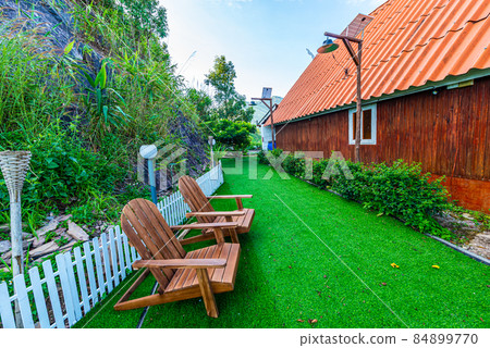 garden next to the house. garden next to the house. 84899770