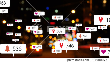 Image of social media icons and numbers over out of focus city and traffic lights 84900074