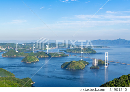 Imabari City, Ehime Prefecture, the clear sky of the Seto Inland Sea and the Kurushima Kaikyo Bridge seen from Kirosan Observatory Park Imabari City, Ehime Prefecture, the clear sky of the Seto Inland Sea and the Kurushima Kaikyo Bridge seen from Kirosan Observatory Park 84901240
