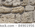 Part of the old wall.. Stone wall as background or texture. 84901956